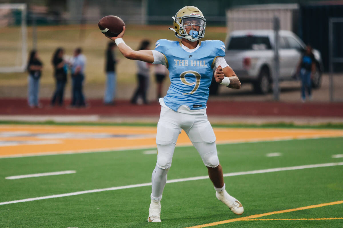 Foothill quarterback Mason Dew looks to pass the ball to a teammate during a game against Las V ...