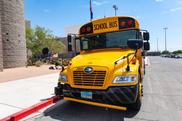 A school bus sits in front of Durango High School in Las Vegas on Thursday, July 28, 2022. (Rac ...