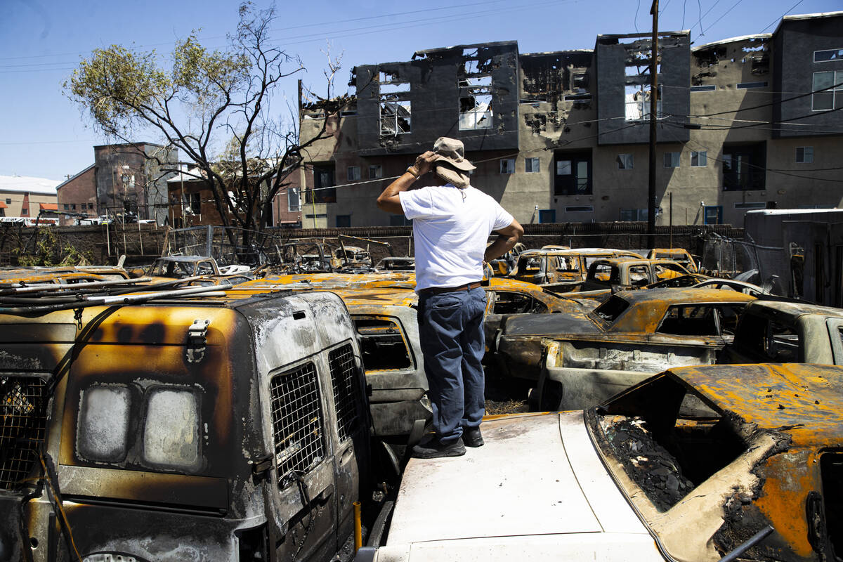 Lazaro Lopez, owner of Perfect Auto Body, surveys the yard where over 30 vehicles where destroy ...