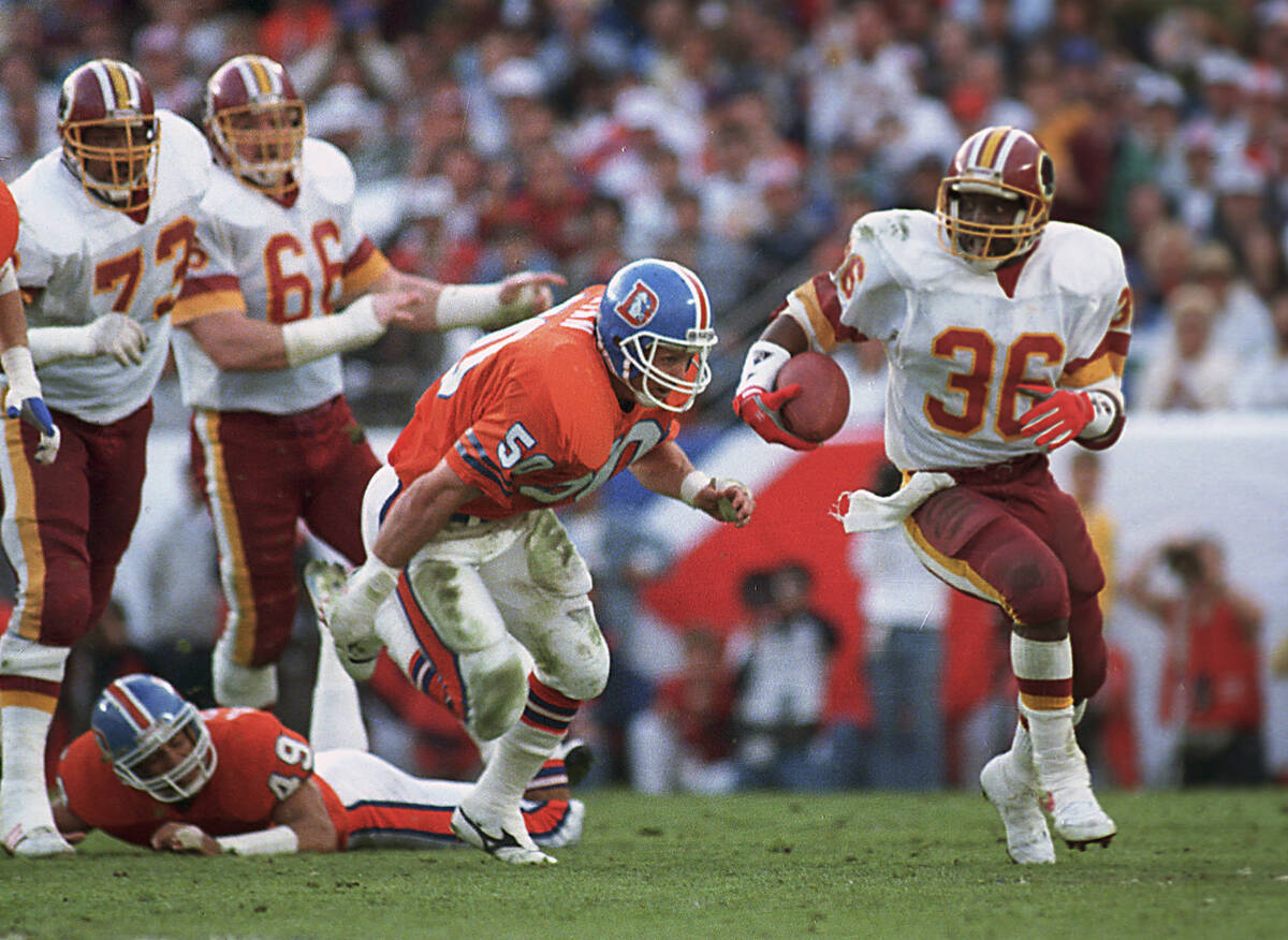 FILE - In this Jan. 31, 1988, file photo, Washington Redskins running back Timmy Smith (36) goe ...