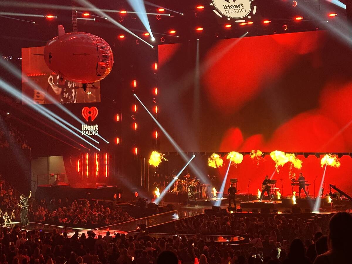 Kane Brown is shown amid stage effects as he performs at the first night of iHeartRadio Music F ...