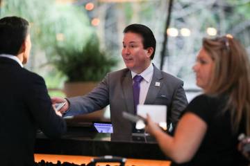 Guests check in to Aria Resort and Casino on Monday, Sept. 18, 2023, in Las Vegas. (Las Vegas R ...