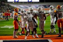 UNLV running back Jai'Den Thomas notes his fourth touchdown of the game against Texas-El Paso o ...