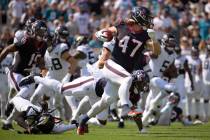 Houston Texans fullback Andrew Beck (47) returns a kickoff for a touchdown against the Jacksonv ...
