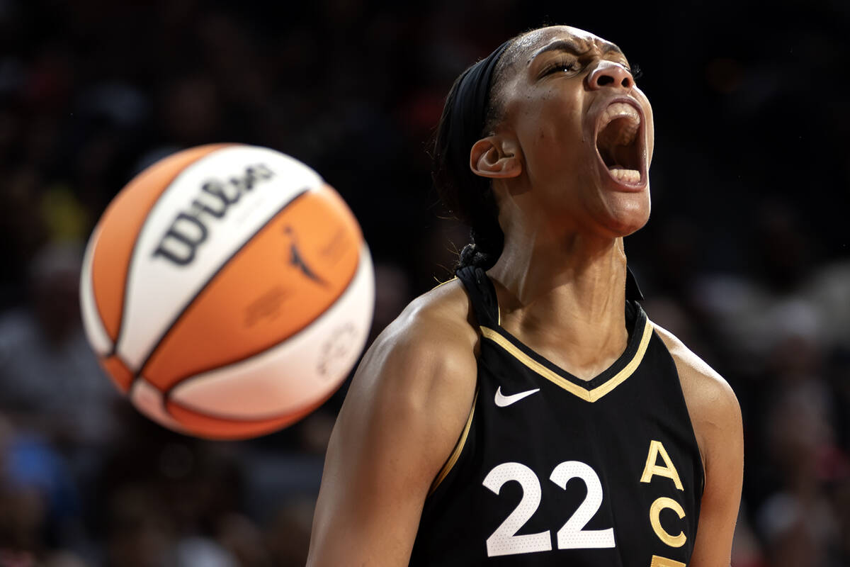 Las Vegas Aces forward A'ja Wilson (22) celebrates after the Dallas Wings fouled her during the ...