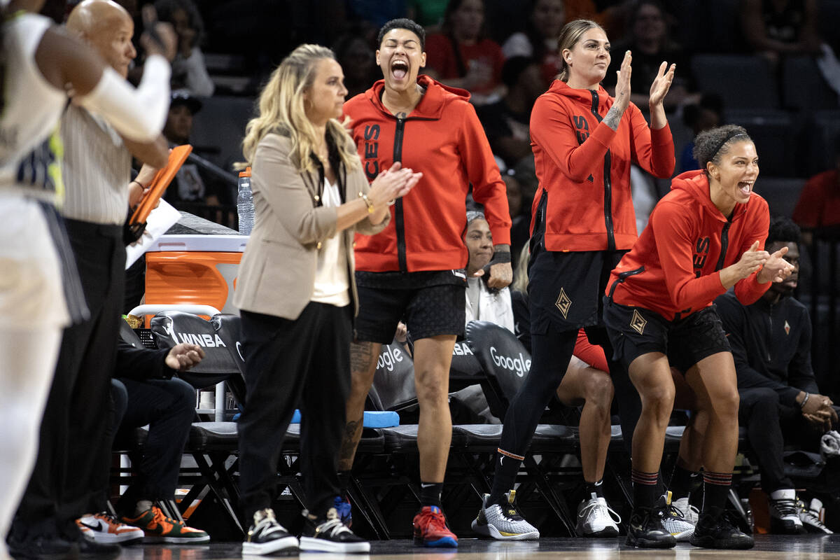 The against the Las Vegas Aces bench goes wild after their team scored during the second half i ...