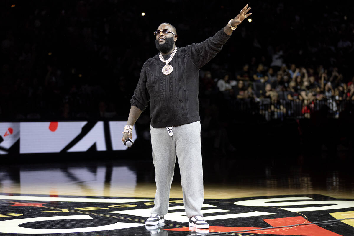 Rick Ross performs during halftime in Game 1 of a WNBA basketball semifinal series at Michelob ...