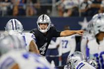 Las Vegas Raiders quarterback Aidan O'Connell (4) directs the offense during a preseason NFL Fo ...