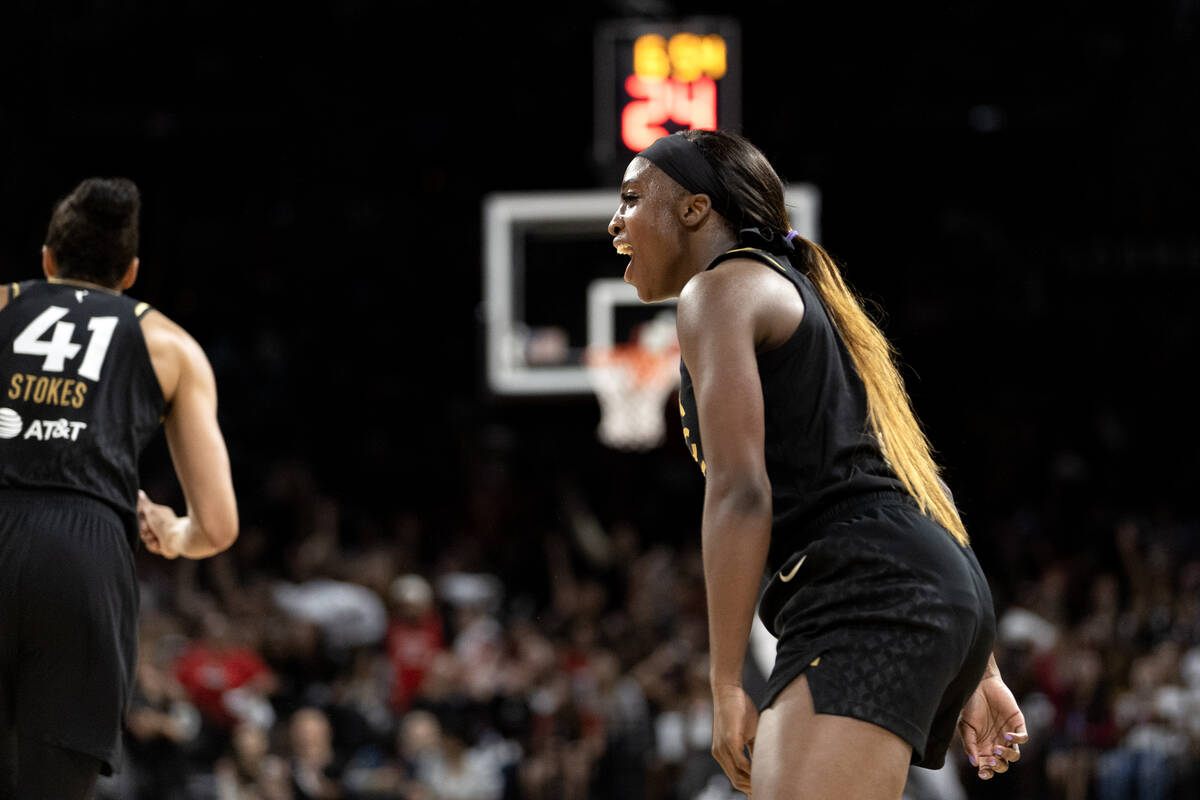 Las Vegas Aces guard Jackie Young (0) celebrates after scoring a three-pointer during the secon ...