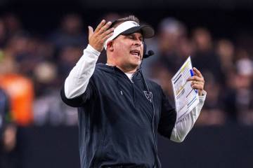 Raiders Head Coach Josh McDaniels argues with a referee after another penalty in favor of the P ...