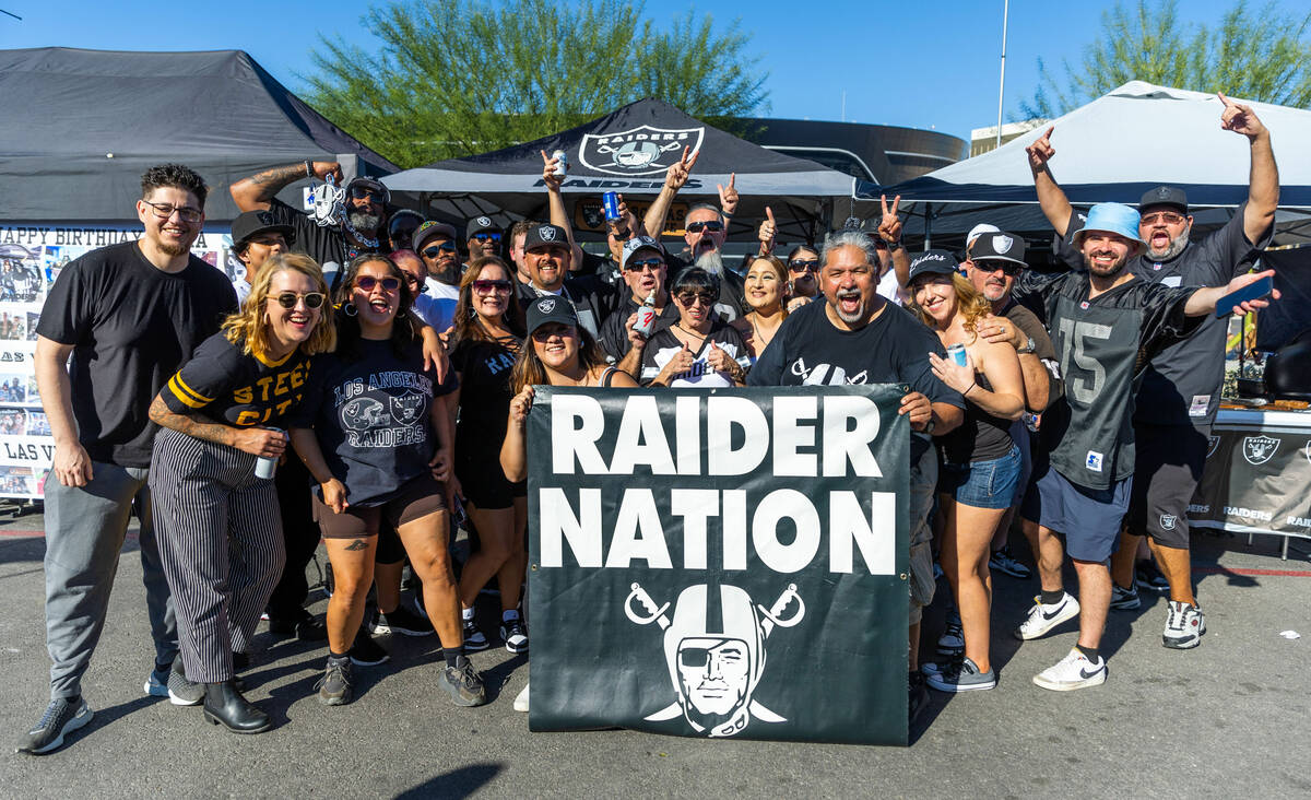 Raiders fans get pumped up during tailgating before the first half of the Raiders versus Pittsb ...