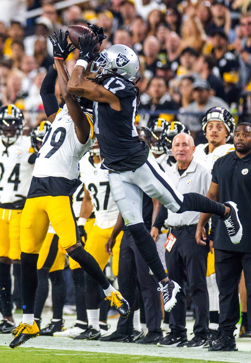 Raiders wide receiver Davante Adams (17) battles for a reception with Pittsburgh Steelers corne ...