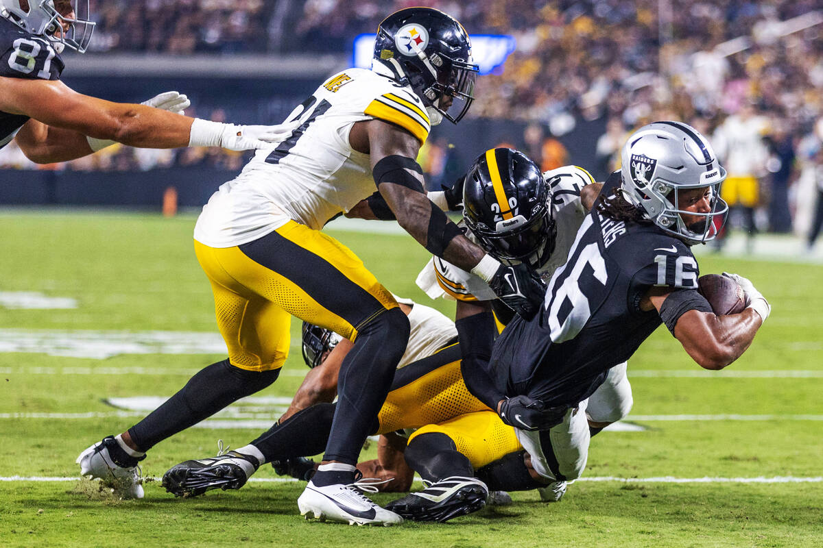 Raiders wide receiver Jakobi Meyers (16) dives for the goal line but is short in the arms of Pi ...