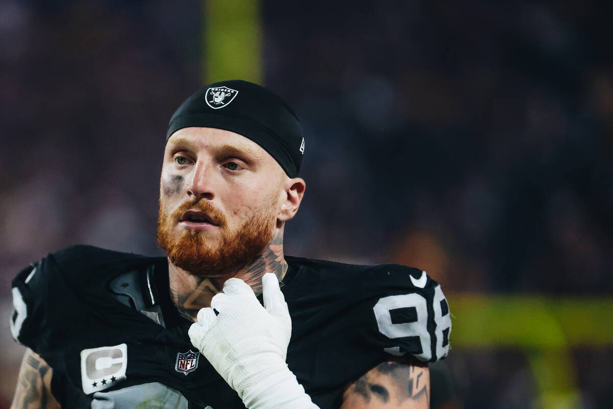 Raiders defensive end Maxx Crosby (98) watches his offensive teammates play during the second h ...