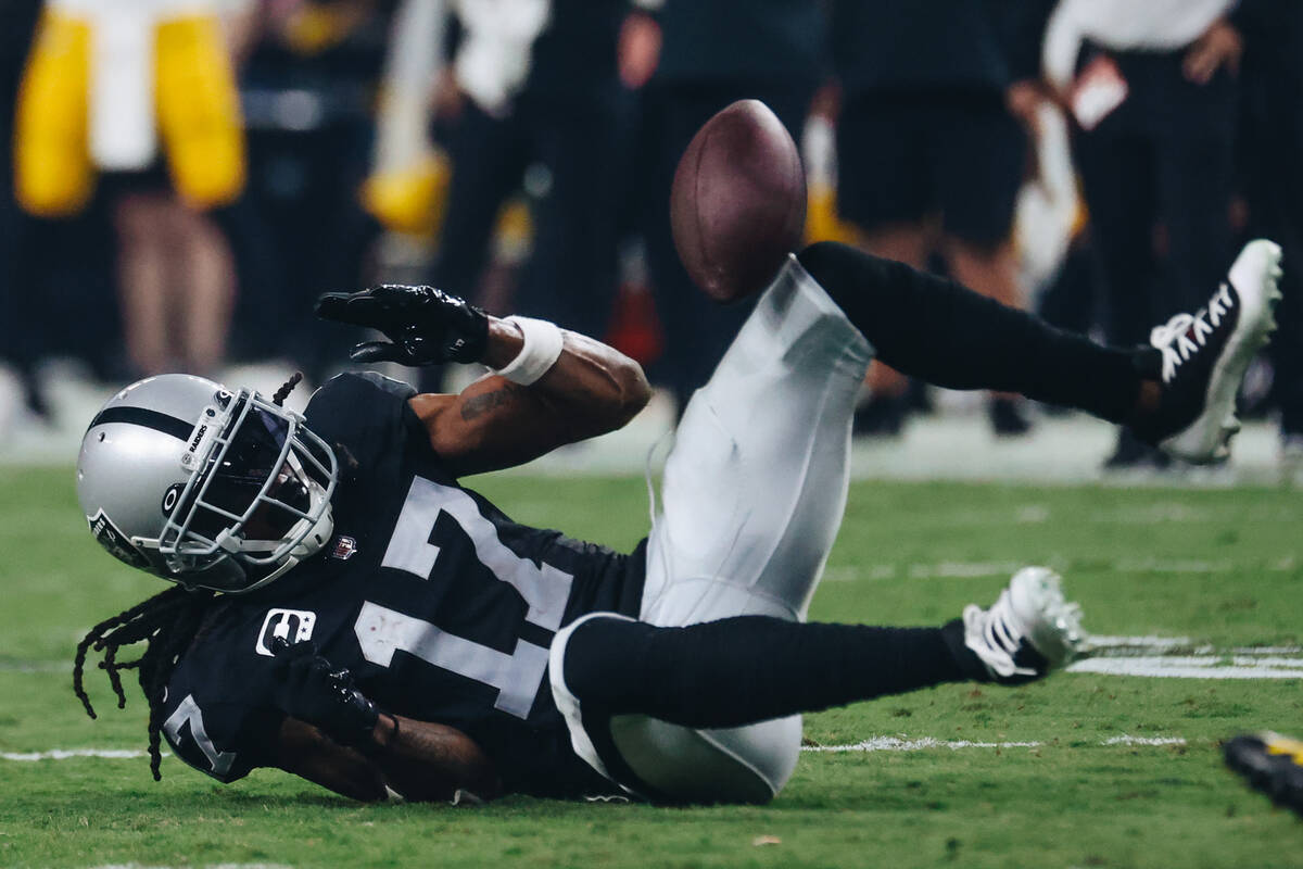 Raiders wide receiver Davante Adams (17) can't pull in a reception the ball during the second h ...