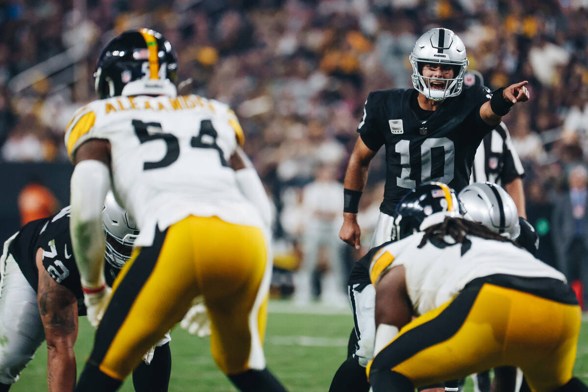 Raiders quarterback Jimmy Garoppolo (10) yells to his teammates during the second half of a gam ...