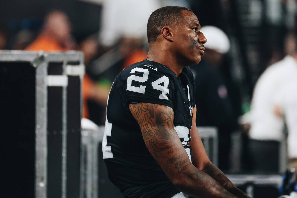 Raiders cornerback Marcus Peters (24) watches the action from the sidelines as the clock runs o ...