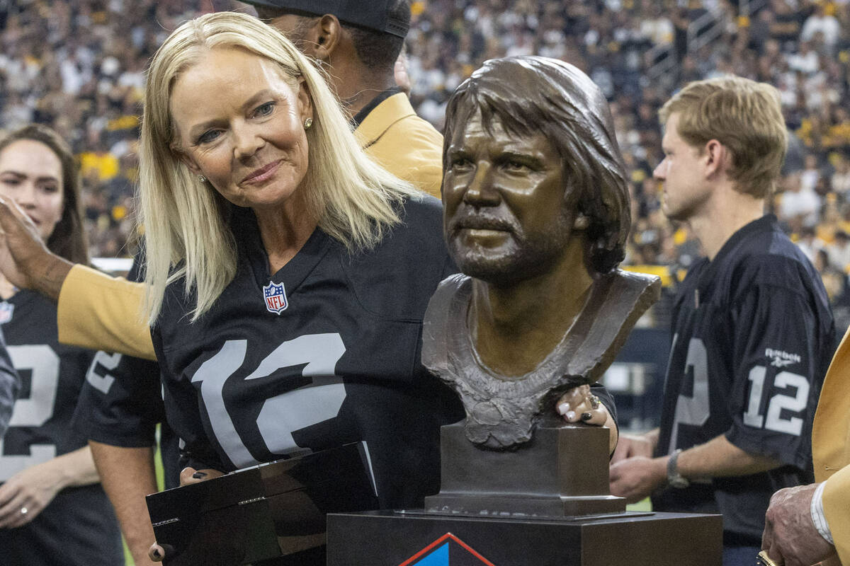 Kendra Stabler-Moyes, daughter of the late Raiders quarterback Ken Stabler, admires her father& ...