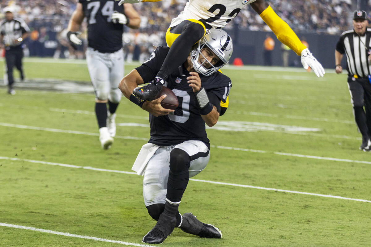 Raiders quarterback Jimmy Garoppolo (10) grimaces as Pittsburgh Steelers safety Damontae Kazee ...