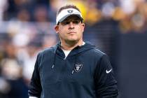 Raiders Head Coach Josh McDaniels looks to the stands during warm ups before the first half of ...