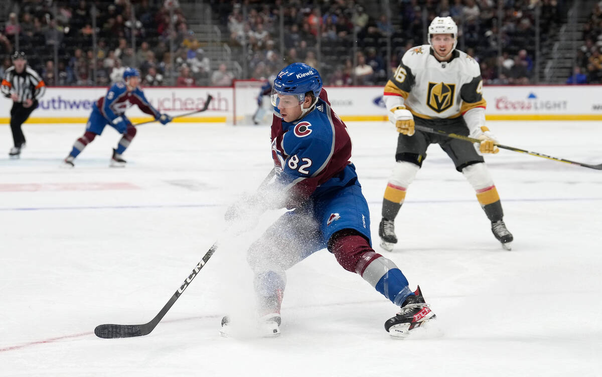 Colorado Avalanche center Ivan Ivan (82) collects the puck as Vegas Golden Knights left wing Jo ...