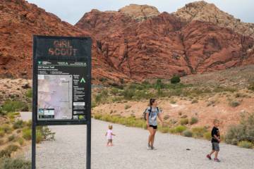 A family walks along Girl Scout trail in Red Rock Canyon in June 2023 in Las Vegas. (Daniel Pea ...