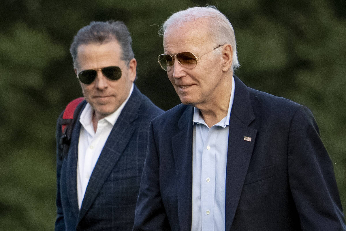 FILE - President Joe Biden, and his son Hunter Biden arrive at Fort McNair, Sunday, June 25, 20 ...