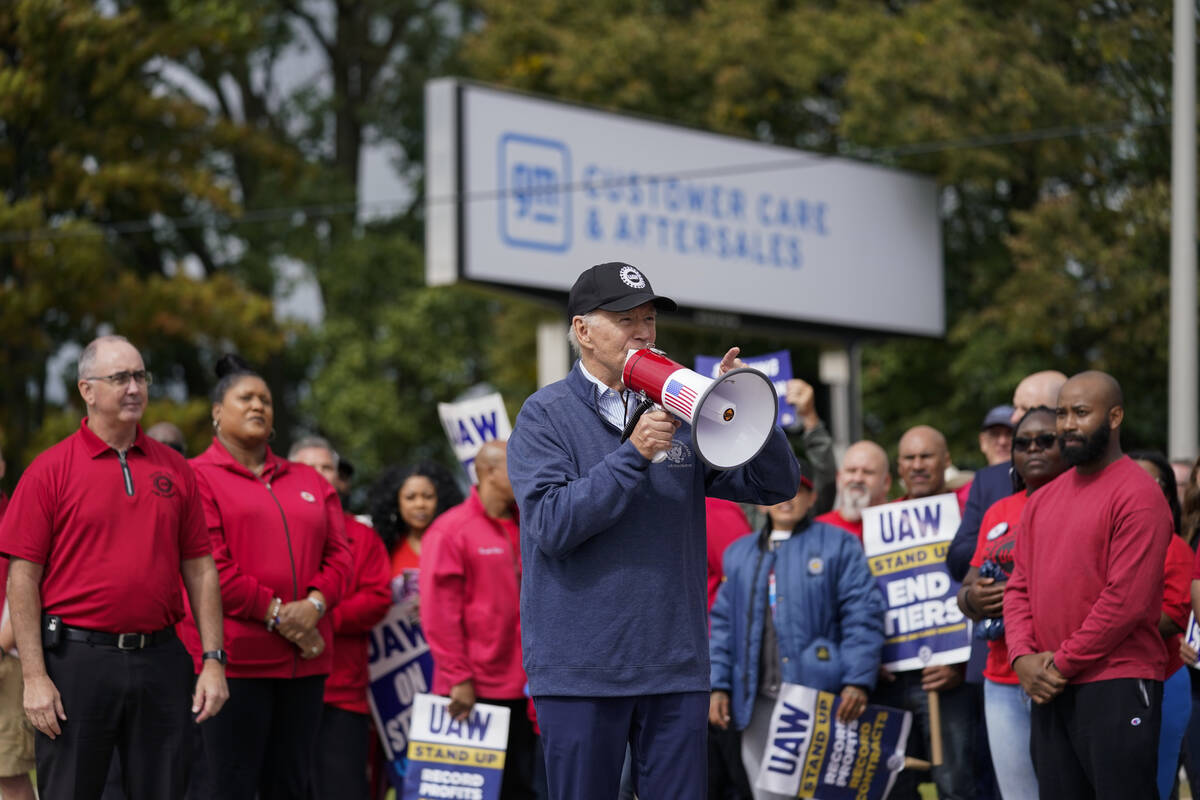 President Joe Biden joins striking United Auto Workers on the picket line, Tuesday, Sept. 26, 2 ...