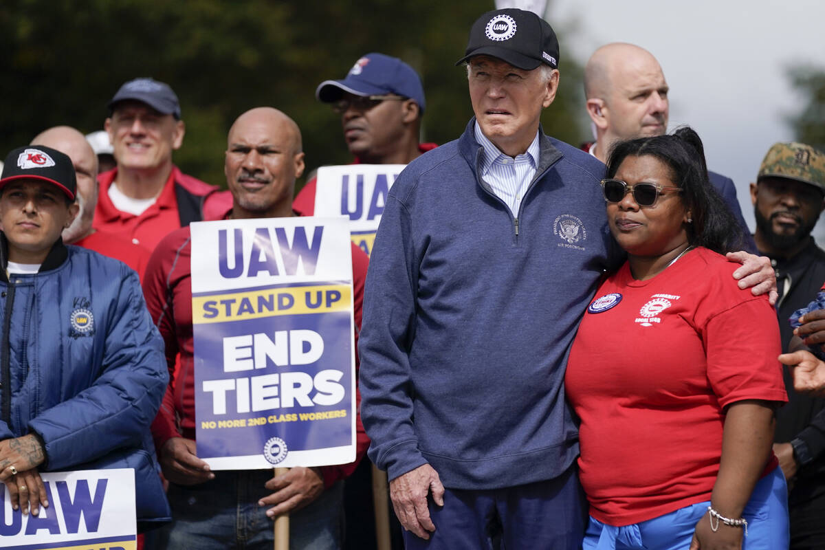President Joe Biden joins striking United Auto Workers on the picket line, Tuesday, Sept. 26, 2 ...