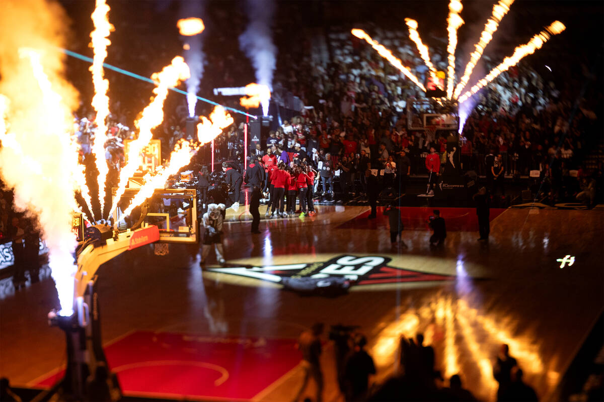 The Las Vegas Aces join after their starting lineup is announced before Game 2 of a WNBA basket ...
