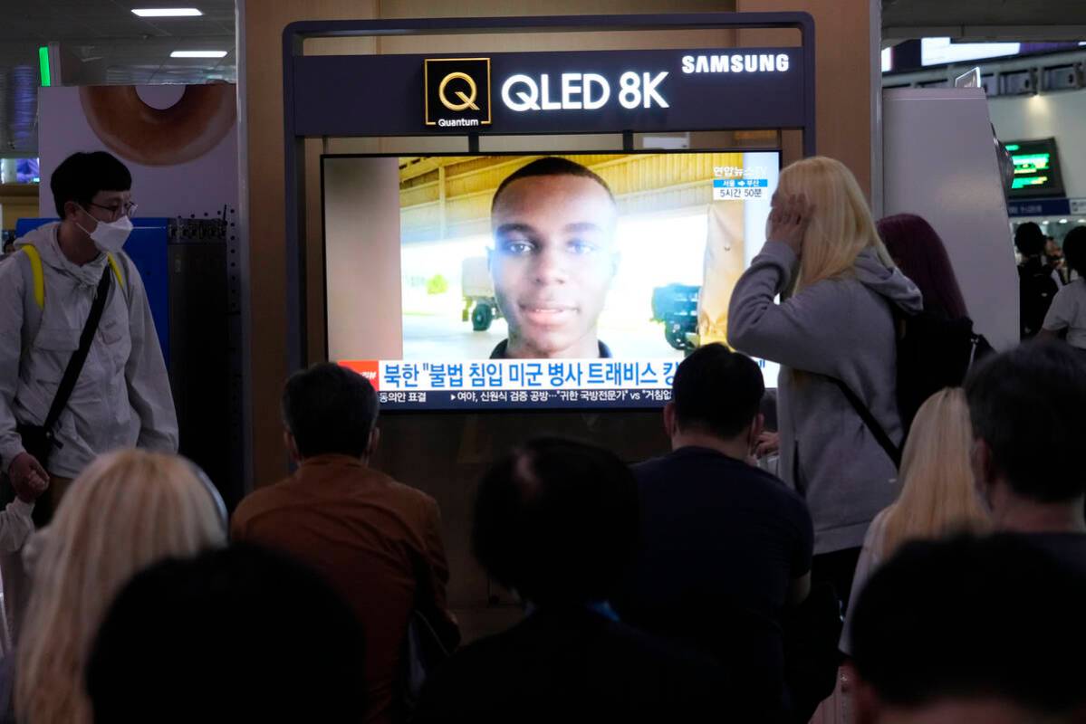 A TV screen shows a file image of American soldier Travis King during a news program at the Seo ...