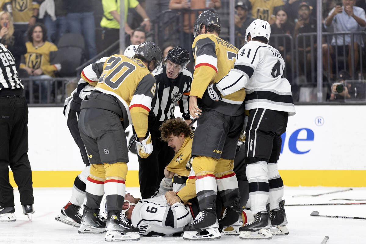 Golden Knights center Brett Howden (21) has words with Kings defenseman Kevin Connauton (6) wh ...