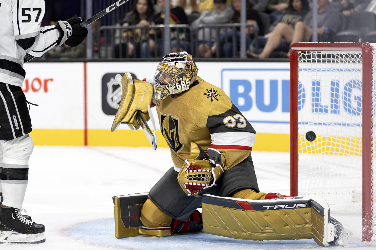 Golden Knights goaltender Adin Hill (33) misses the save on a Kings goal during the second peri ...