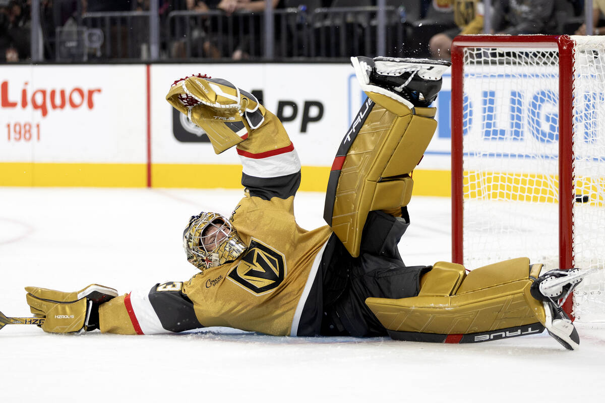 Golden Knights goaltender Adin Hill (33) misses the save on a goal shot by Kings center Tyler M ...