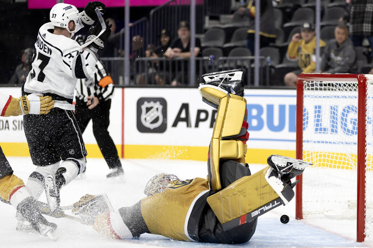 Golden Knights goaltender Adin Hill (33) dives but can’t save the game-winning goal by Kings ...
