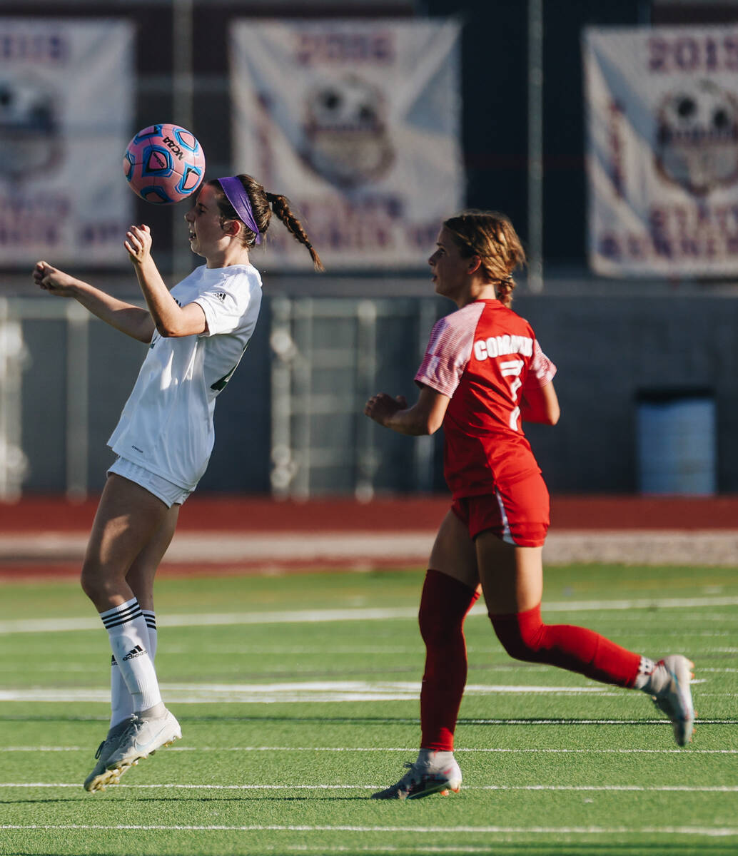 Palo Verde midfielder Gina Rumschlag (21) heads the ball during a game against Coronado at Coro ...