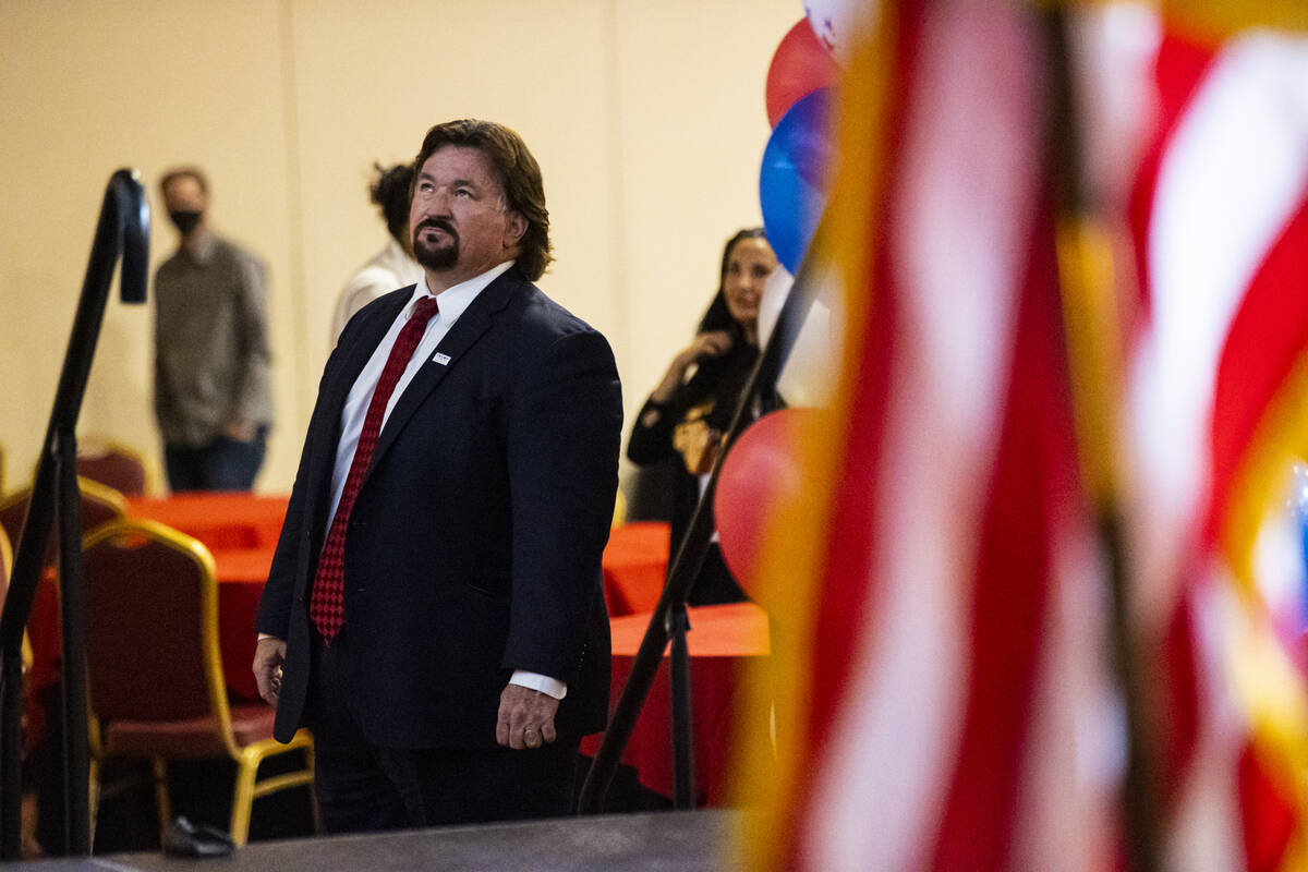 Nevada Republican Party Chairman Michael McDonald watches results come in during an election ni ...