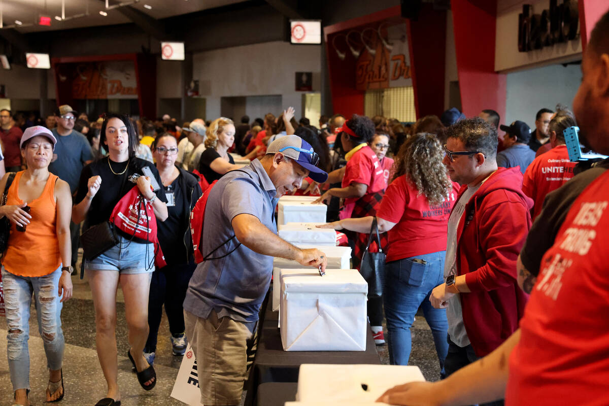Culinary Union members cast their ballots during a strike vote at Thomas & Mack Center on t ...