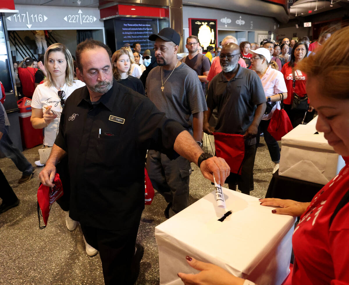 Culinary Union members cast their ballots during a strike vote at Thomas & Mack Center on t ...