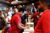 Culinary Union members cast their ballots during a strike vote at Thomas & Mack Center on t ...