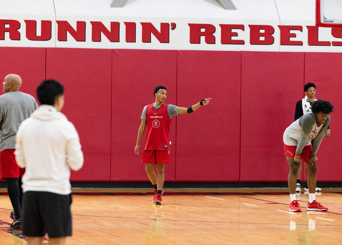 UNLV Rebels point guard Dedan Thomas Jr., (11) directs his teammates during team practice, on W ...