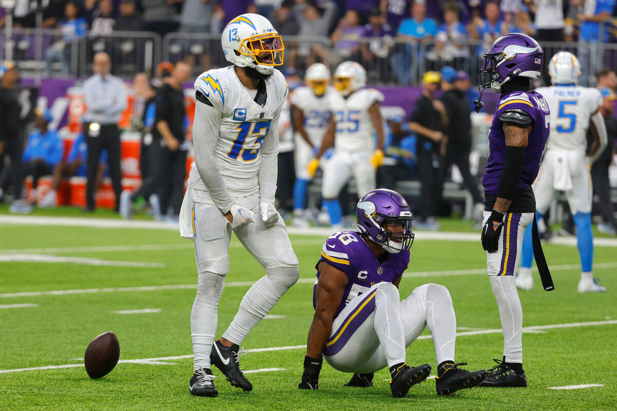 Los Angeles Chargers wide receiver Keenan Allen (13) celebrates in front of Minnesota Vikings l ...