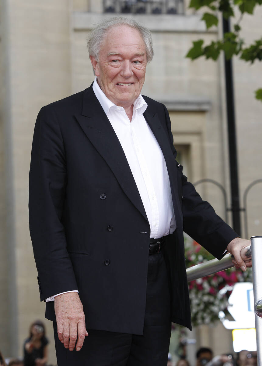 FILE - British actor Michael Gambon arrives in Trafalgar Square, in central London, for the wor ...