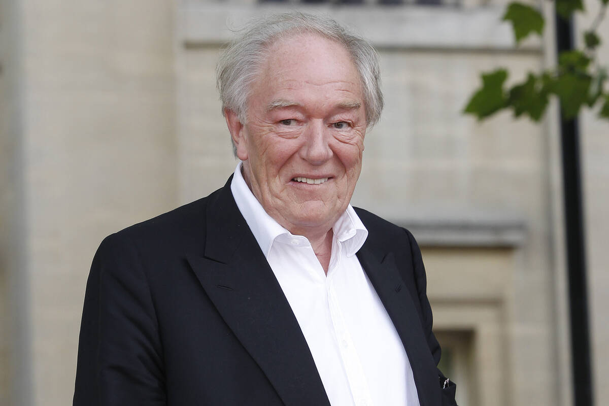 FILE - British actor Michael Gambon arrives in Trafalgar Square, in central London, for the wor ...
