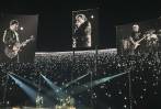 Bono embraces Elvis, shouts to McCartney in Sphere opener