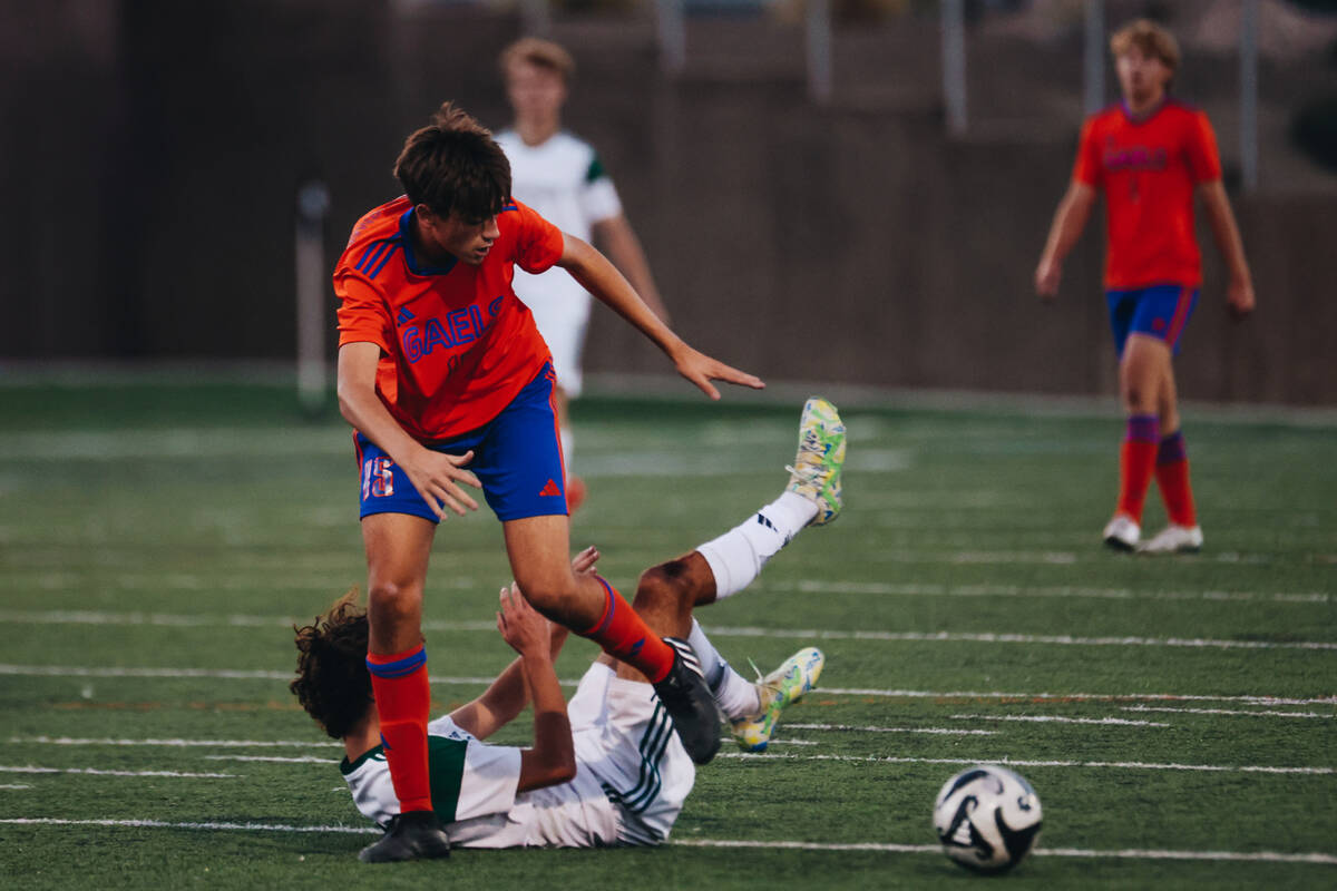 Bishop Gorma’s Massimiliano Musi (15) runs over a Palo Verde player as he tries to get t ...
