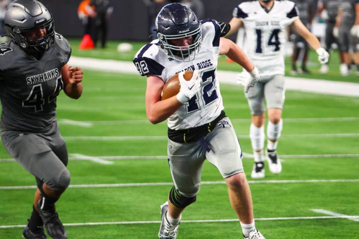 Shadow Ridge's Evan Cannon (42) runs the ball to score a touchdown against Silverado during the ...