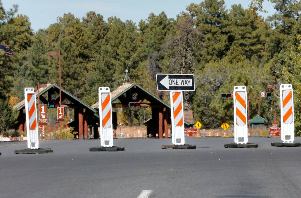The Grand Canyon National Park entrance is blocked off, in Tusayan, Ariz., Oct. 8, 2013, becaus ...