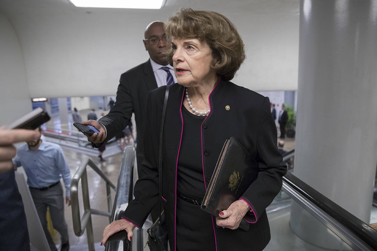 Sen. Dianne Feinstein, D-Calif., speaks to reporters as she arrives at the Capitol in Washingto ...