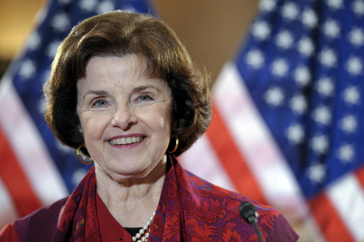 FILE - Sen. Dianne Feinstein, D-Calif., smiles after announcing the introduction of a Senate bi ...